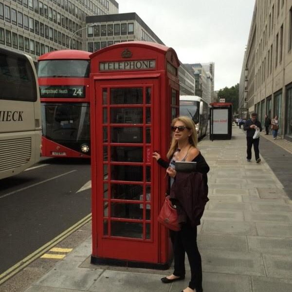 Maddie Lock at a phone booth in London